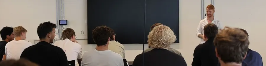 Vidar Phoenix speaking to a classroom of students